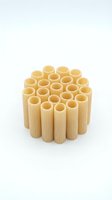 Wooden dowel pegs arranged in organized rows on white background, isolated and ready for design use in woodworking projects, furniture assembly, and craft applications.