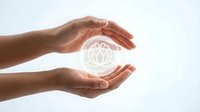 Hands protecting glowing brain icon symbolizing mental health care, mindfulness and cognitive wellness on white background.