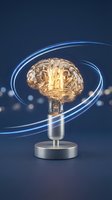 Glowing brain lightbulb with blue energy rings on dark background symbolizing innovation, creativity, intelligence and bright ideas for business concepts.
