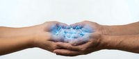 Two hands gently cupping glowing blue digital network connections symbolizing partnership, collaboration and technology sharing in business.