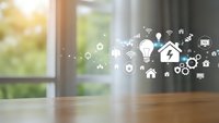 Smart home automation technology icons floating in modern living room with wooden table and window showing connected devices and IoT symbols.