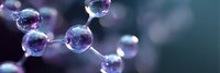 Shiny molecular structure with connected spheres glowing in purple and blue tones against dark background, scientific concept for chemistry and research.