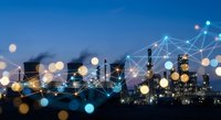 Smart industrial facility with digital network connections and glowing data points at twilight for technology and automation concepts.