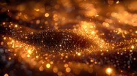 Golden glowing particles flow in dark space creating magical atmosphere with bokeh light effect and shimmering sparkles. Abstract festive background.