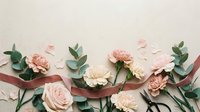 Elegant pink roses and carnations with eucalyptus leaves arranged with flowing ribbon on neutral background for wedding and romantic designs.
