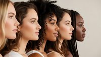 Five diverse women in profile showcasing different ethnicities and natural beauty for skincare, cosmetics and wellness campaigns.