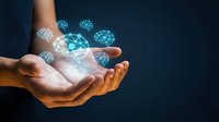 Hands holding glowing digital network globe with connected nodes, representing global communication, data transfer, and technology innovation for business and connectivity concepts.