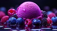Pink berry ice cream scoop surrounded by fresh blueberries, raspberries and blackberries on dark reflective surface with dramatic lighting and rich purple tones.