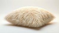 Fluffy cream fur throw pillow isolated on white background, soft cozy home decor accent for living room or bedroom interior design.