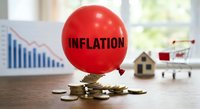 Red balloon with inflation text on coins stack with financial charts house model and shopping cart representing economic pressure and rising costs.