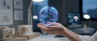 Architect holding glowing digital globe above architectural models in modern office workspace, representing global business innovation and sustainable development planning.