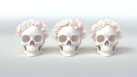 White decorative skulls adorned with delicate pink flower crowns arranged in row on light background, creating soft romantic gothic aesthetic.