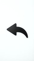 Black curved arrow pointing left isolated on white background for web design, presentations and graphic projects.