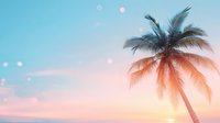 Dreamy tropical sunset with silhouette of palm tree against pastel pink and blue sky, lens flare creates magical bokeh effect for summer vacation mood.