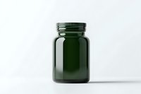 Dark green glass medicine bottle with metal screw cap on white background, minimalist pharmaceutical container for supplements and vitamins storage.