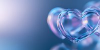 Transparent heart shape made of water or glass with blue and pink bokeh background, romantic concept for valentines day and wedding designs.
