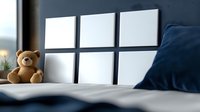 Soft brown teddy bear sitting on white bedding next to navy blue pillow against dark wall with empty white frames, creating cozy bedroom atmosphere for interior design.