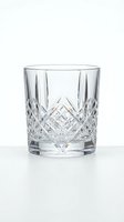 Crystal cut glass tumbler with diamond pattern isolated on white background for luxury dining and beverage service.