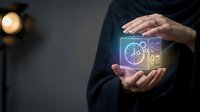 Woman holding glowing neon tarot cards and zodiac wheel in hands, astrology and divination concept for spiritual guidance and fortune telling services.