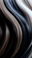 Wavy strands of hair in multiple tones ranging from platinum blonde to deep black create flowing curves and lines against dark background.