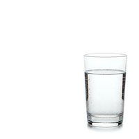 Clear glass filled with fresh water showing bubbles on white background isolated for health and hydration concepts.