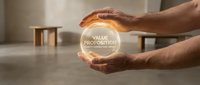 Male hands holding glowing orb with value proposition text, representing business concept, marketing strategy, and corporate communication for presentations and websites.