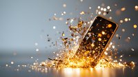 Smartphone explosion with golden sparkles and glowing particles against gray background, dramatic lighting effect creates magical atmosphere for tech concepts.