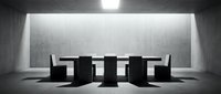 Young professional woman with light skin tone sitting at modern conference table in minimalist concrete boardroom, suitable for corporate business presentations and website design.
