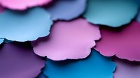Overlapping paper circles in vibrant pink, purple, and turquoise create dynamic layered pattern with soft shadows and depth effect for modern design backgrounds.