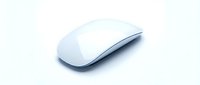 Sleek white wireless computer mouse on a light background, showcasing modern minimalist design for technology and office workspace concepts.