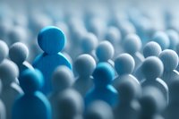 Blue figure standing out among crowd of gray figures, symbolizing leadership, individuality, and unique perspective in business environment.