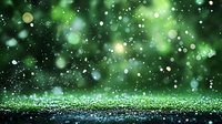 Magical green glitter background with bokeh lights and sparkles scattered on reflective surface creates dreamy atmosphere for festive designs and holiday projects.