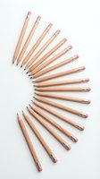 Wooden pencils with pink erasers arranged in circular pattern on white background, isolated for educational and office supply designs.