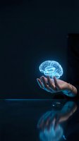 Hand holding glowing digital brain hologram against dark background, representing artificial intelligence, innovation, technology, and neural networks for business and science concepts.