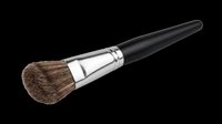Makeup brush with natural bristles, metal ferrule, and black handle isolated on transparent background. Ready for beauty product design, cosmetics packaging, tutorials, and print-on-demand applications.