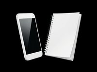 White smartphone with blank screen and spiral-bound notebook isolated on transparent background, ready for design use on t-shirts, stickers, print-on-demand products, and digital designs.