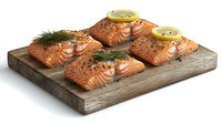 Raw salmon fillets seasoned with herbs, spices and lemon slices arranged on rustic wooden cutting board, fresh fish preparation for cooking or grilling.