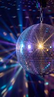 Sparkling disco ball with colorful light reflections creating vibrant party atmosphere for nightclub entertainment and celebration events.