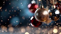 Sparkling gold Christmas ball ornament with blurred red decorations against dark background, festive bokeh lights creating magical holiday atmosphere.