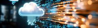 Digital cloud computing technology with glowing data streams and orange light trails against dark background, representing modern network infrastructure.