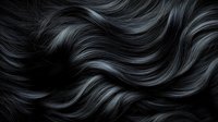 Luxurious dark hair with flowing waves creates elegant texture for beauty and haircare concepts. Silky strands showcase natural movement and shine.