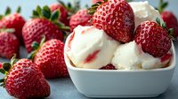 Fresh ripe strawberries with creamy vanilla ice cream scoops in white ceramic bowl against blue background, macro food photography for dessert menu.