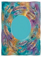 Ornate feathers arranged in circular frame with watercolor background in turquoise, purple, and gold tones. Isolated oval space ready for text, design, or product placement on apparel and marketing materials.