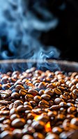 Fresh coffee beans roasting with rising blue smoke and visible heat, macro shot showing rich brown colors and natural texture for food and beverage industry.