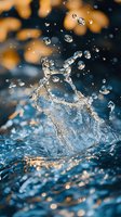 Macro shot of water splash crown formation with suspended droplets against blurred golden bokeh background, capturing liquid dynamics in motion.