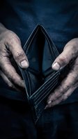 Empty wallet in elderly hands showing financial hardship and poverty concept for economic crisis awareness campaigns.