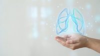Hand holding glowing blue lungs hologram representing respiratory health, medical care and pulmonary wellness concepts for healthcare presentations.