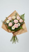 Fresh flower bouquet with pink roses and white daisies wrapped in brown kraft paper on white background for greeting cards and gift concepts.