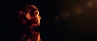 Digital human head profile dissolving into glowing orange particles against dark background for technology and artificial intelligence concepts.