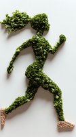 Creative silhouette of running person made from fresh green kale leaves on white background, symbolizing healthy lifestyle and natural fitness nutrition.